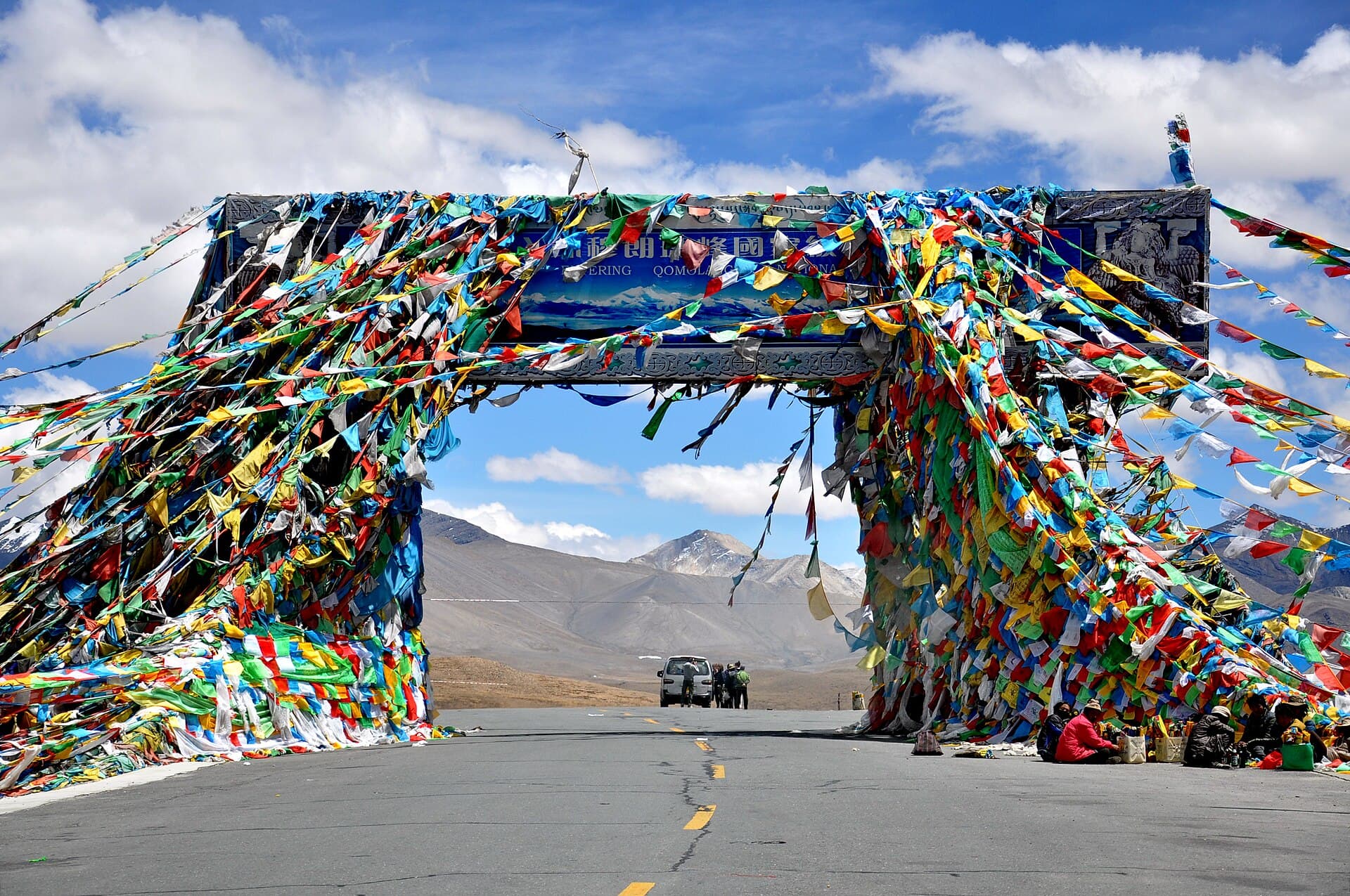 Prayer flags strung across a Himalayan pass